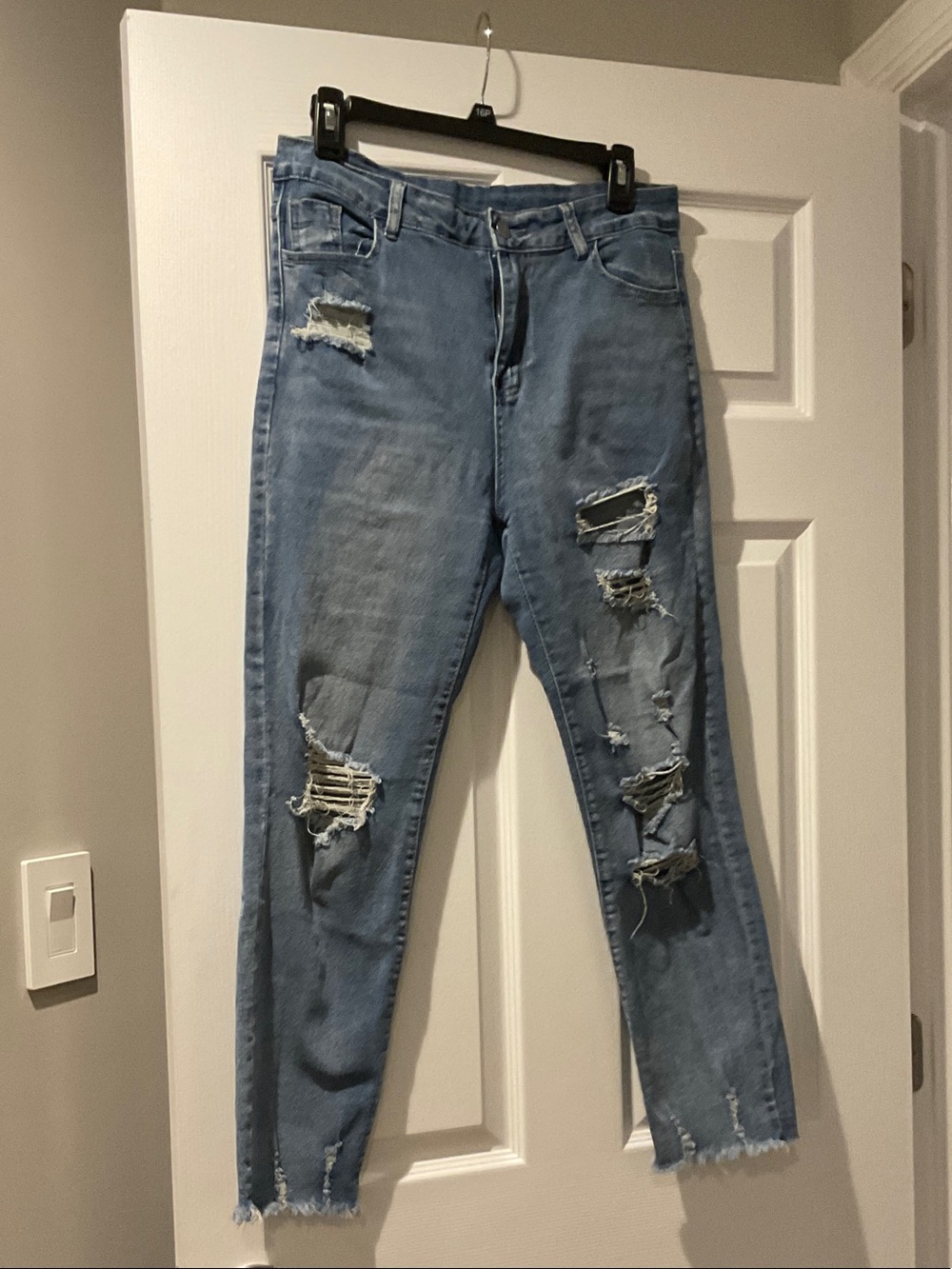 Light Blue Distressed Women's Jeans size large.